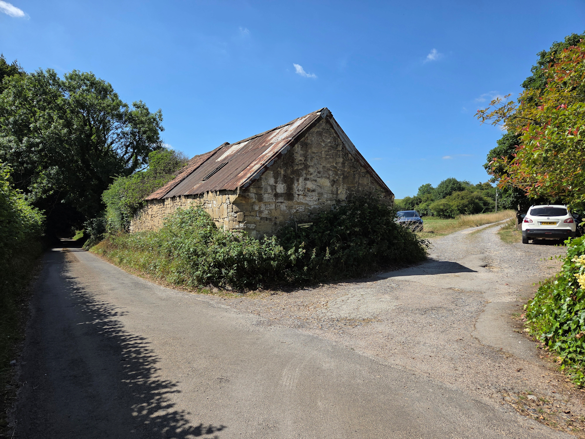 View of barn and road access